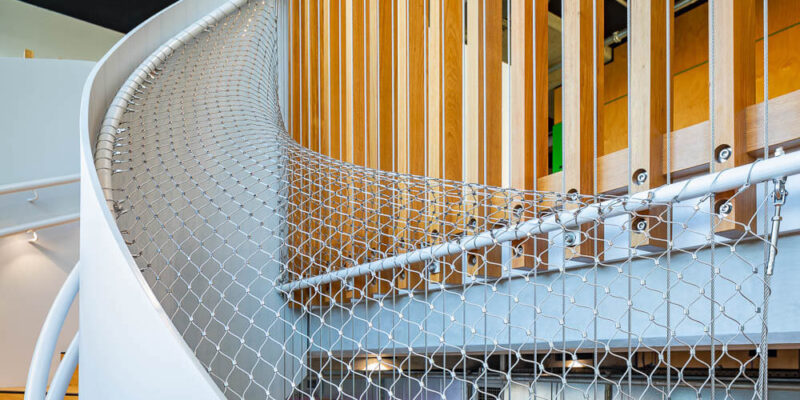 Securing Commercial Staircases with Stainless Steel Mesh